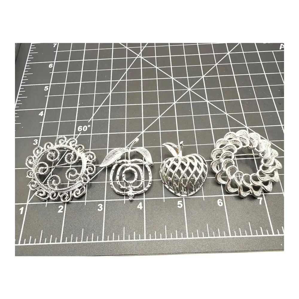 Sarah Coventry four silver